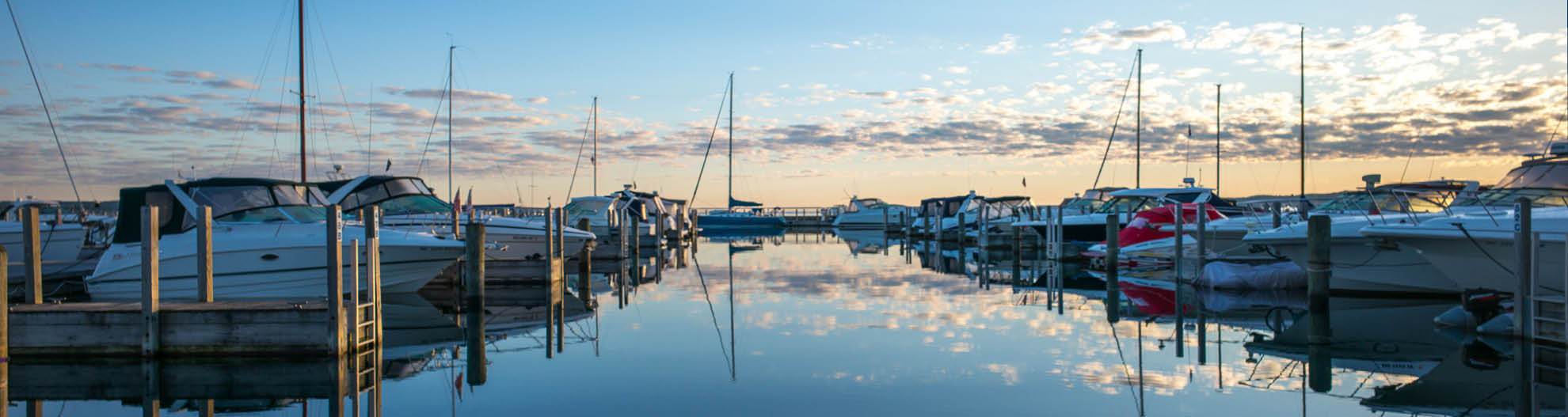 Boats docked at harbor